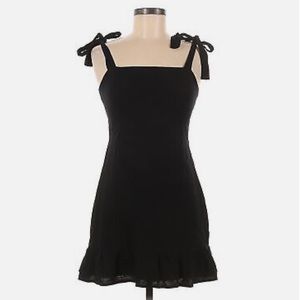 Black mini dress with adjustable sleeves